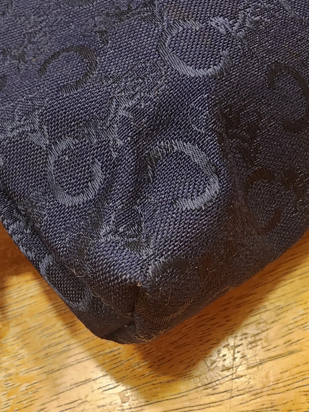 vintage item is a Celine C Macadam Horse Carriage Toiletry/Cosmetic Pouch,